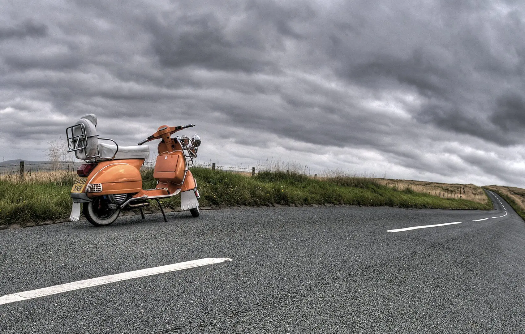 photography-of-classic-motorcycle-on-road-995487 | The Scooter Shop